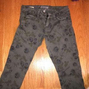 Olive green floral patterned skinny jeans